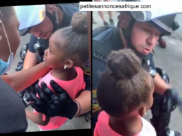 Une petite fille demande à un policier si elle va se faire tirer dessus