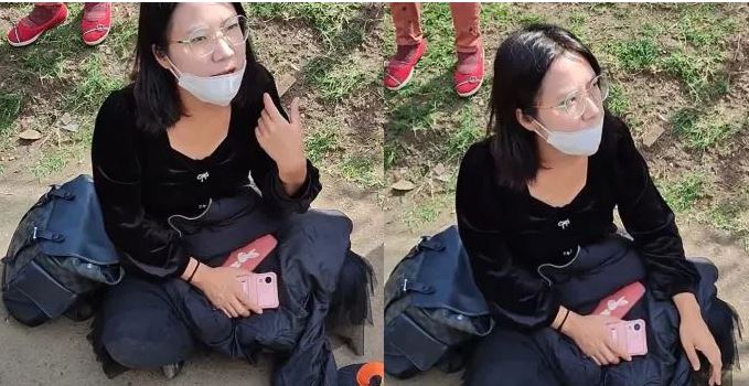 Une chinoise mendie pour un billets d'avion au Kenya